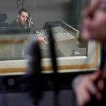 People working in recording studio