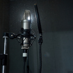 Recording microphone in dark studio
